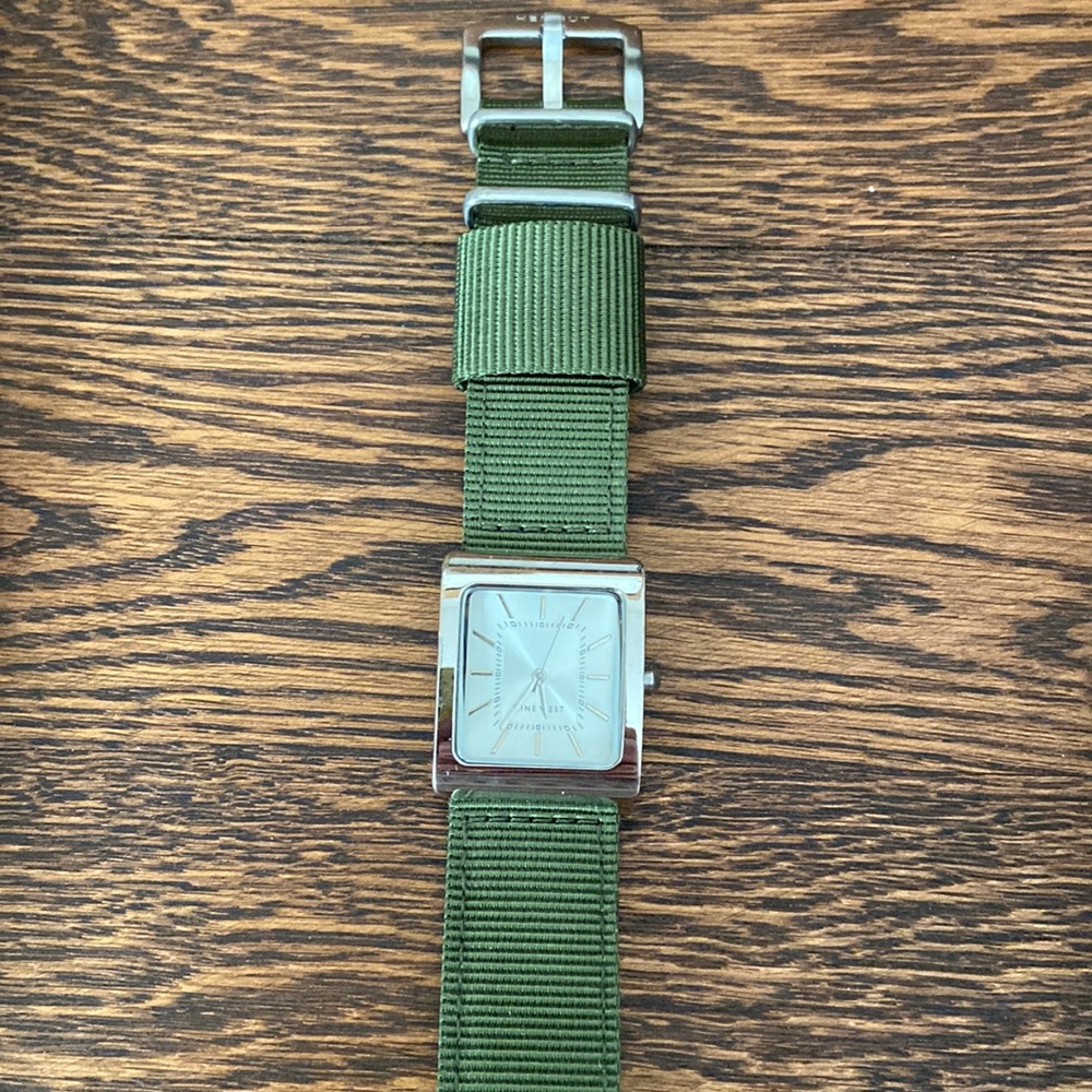 Green watch with firm band